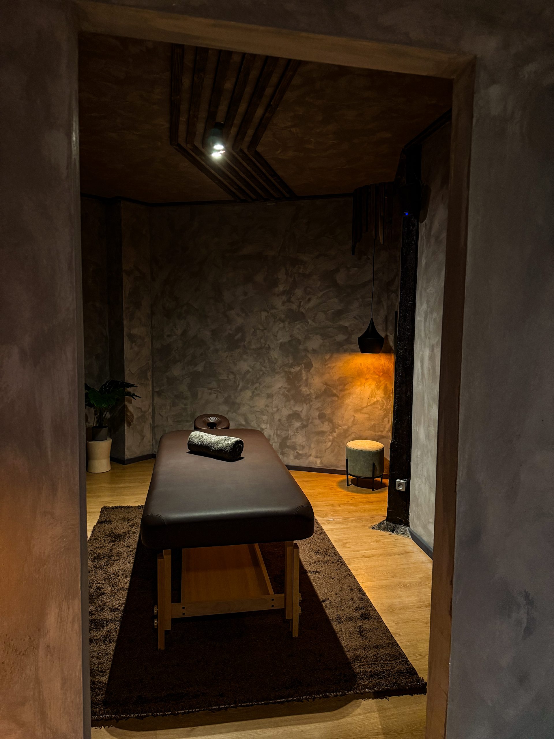 Interior de Arcadea — cabina de masaje